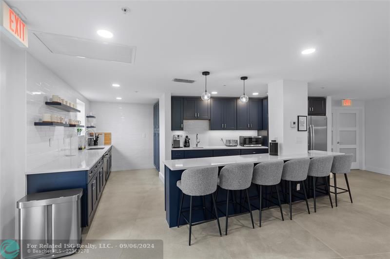 Separate laundry room with storage in condo