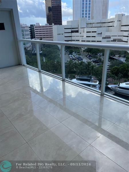 High-end Designer Porcelain Tile Balconies as Well as Same Flooring Throughout the Entire Interior Gramercy Unit