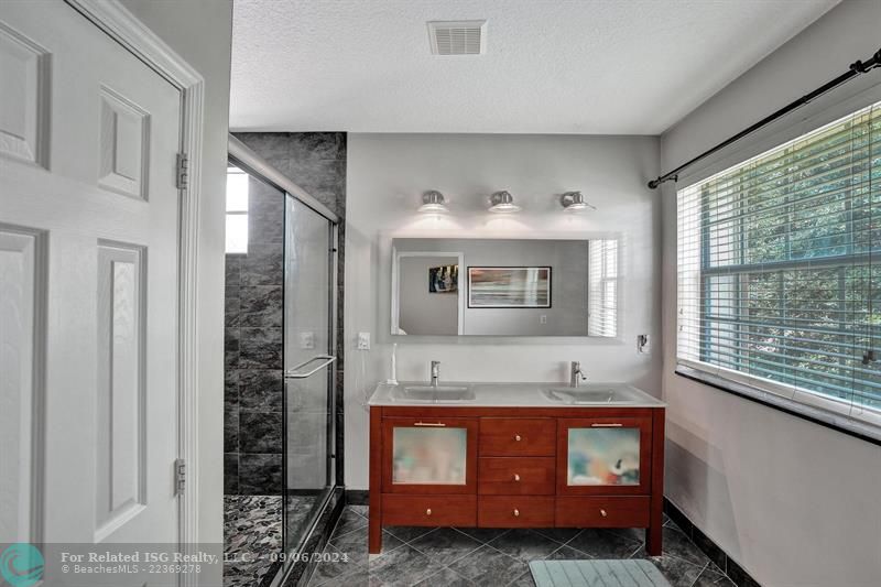 remodeled modern master bathroom