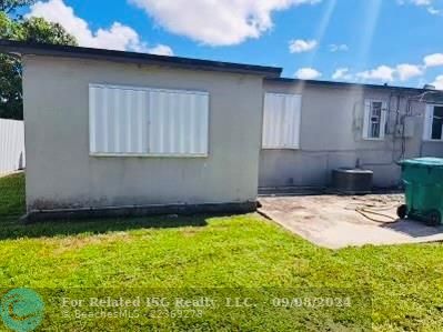 Backyard with shutters on property 1815 NW 121 ST., Miami, FL