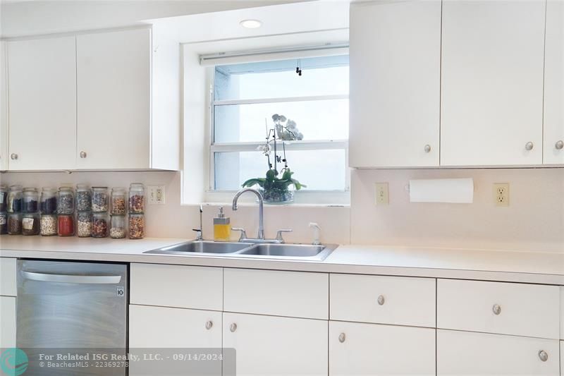 white kitchen with window