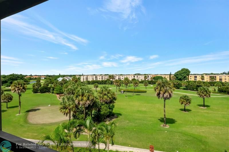 Expansive Golf Course Views From the Patio in this 1906 Sq Ft  Penthouse Corner Unit!