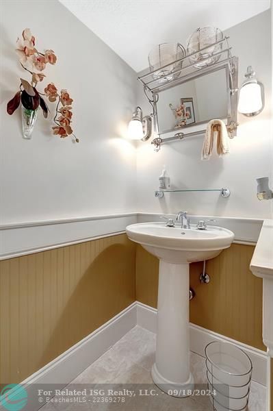 1/2 Bath for Guests! Beautiful Trim  Woodwork!