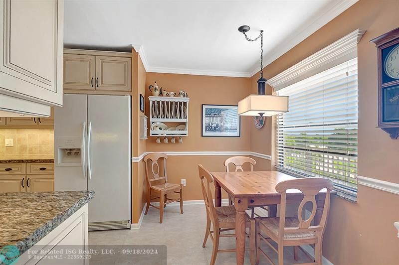 Eat in Kitchen Area with Wood Trim Detailing!