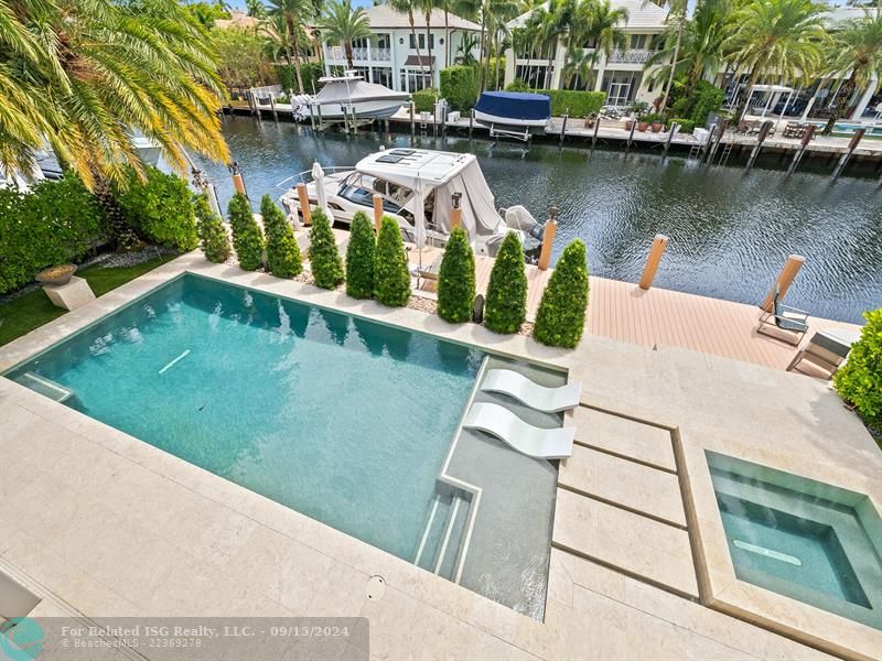 Heated saltwater pool with infinity edge spa