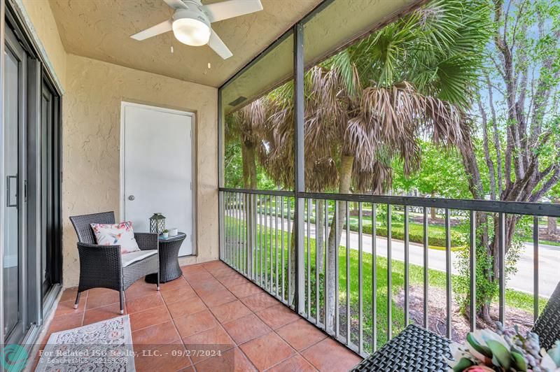 Covered and screened tiled patio