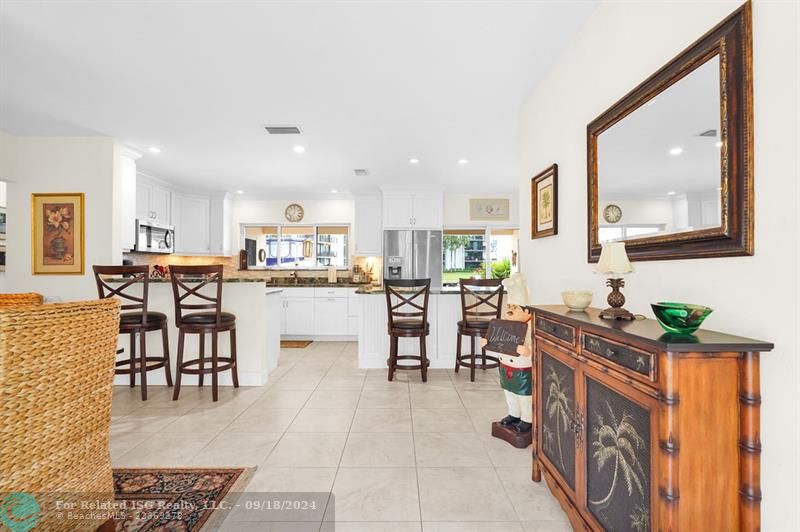 LOOKING FROM ENTRY TOWARDS OPEN KITCHEN