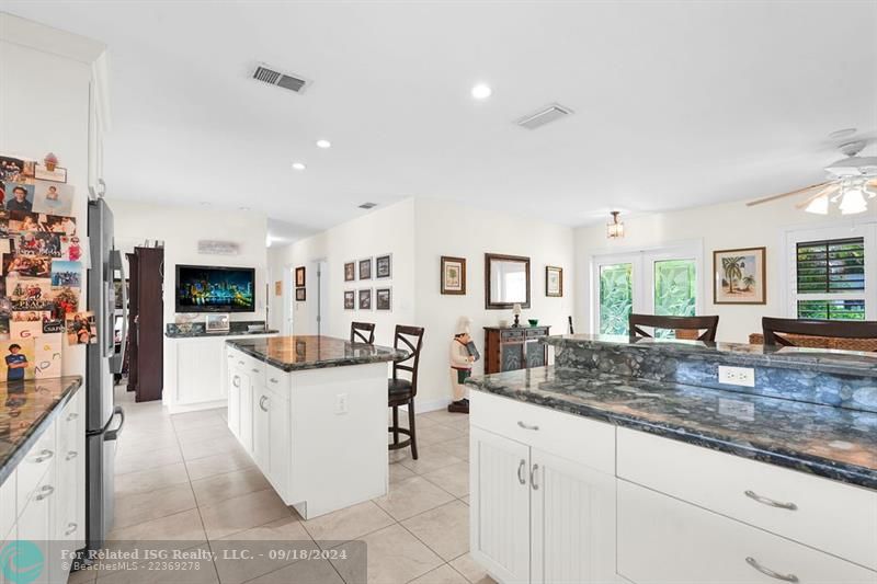 BEAUTIFUL OPEN KITCHEN WITH 2 BREAKFAST BARS