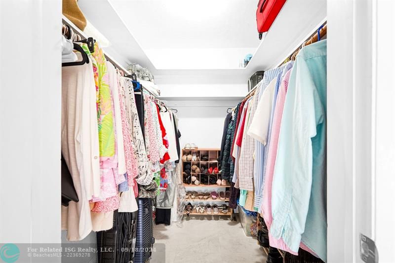 WALK-IN CLOSET IN MASTER BEDROOM