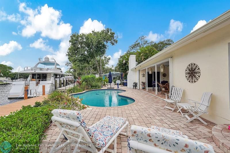 LARGE SITTING AREAS AROUND POOL