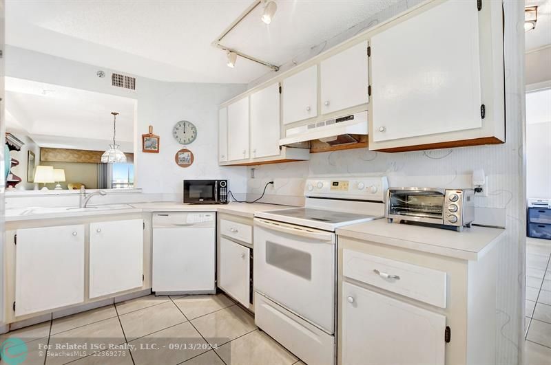 Kitchen open to Living and Dining areas and Views!