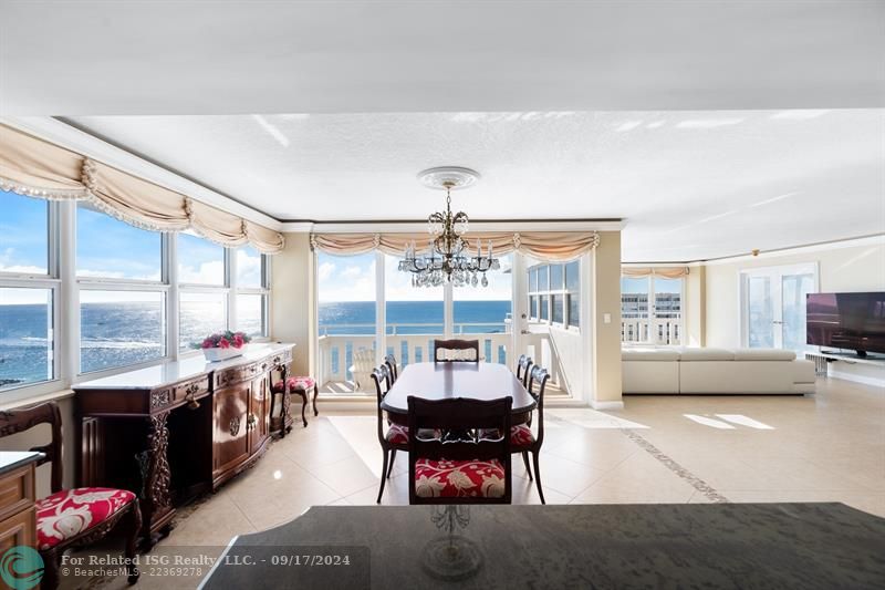 Dining room table and sideboard as pictured have been removed and replaced with a  modern dining table