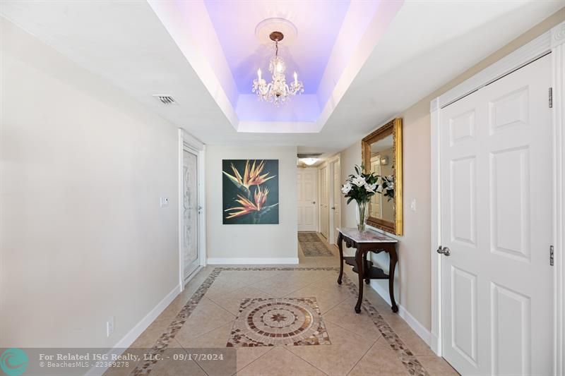 Dining room table and sideboard as pictured have been removed and replaced with a  modern dining table