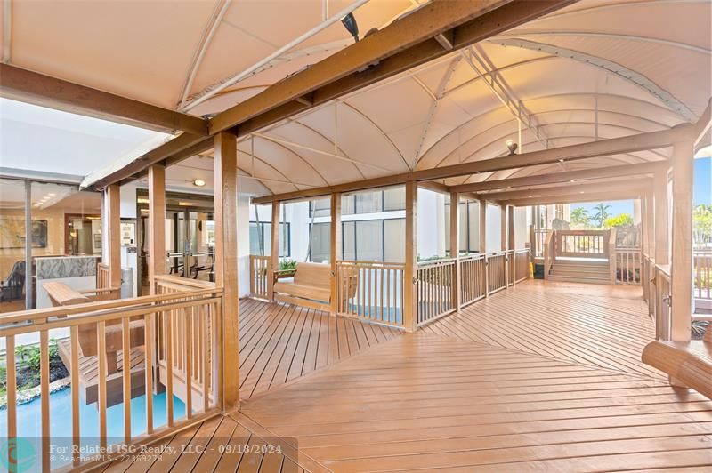 Covered Deck & Partial View of Water Feature