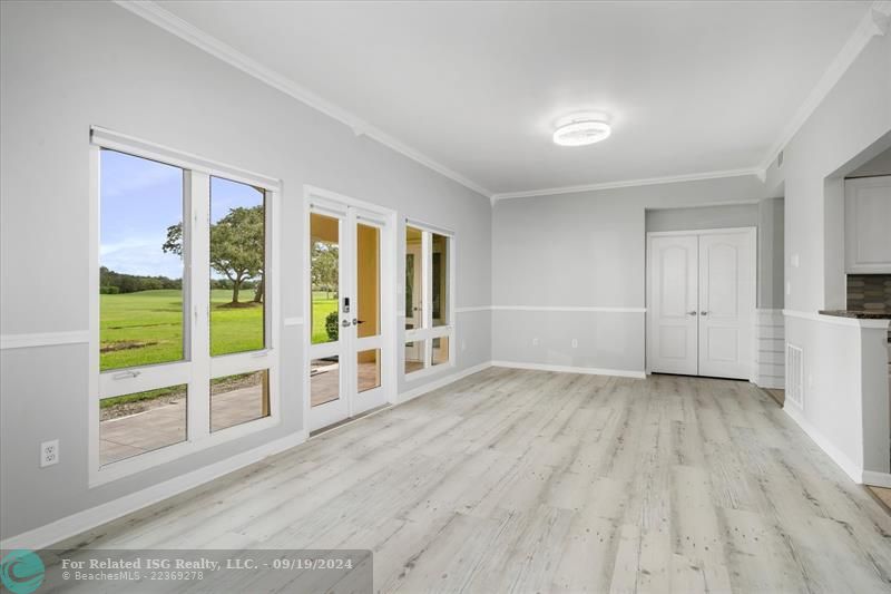 Spacious Living Room with new flooring throughout