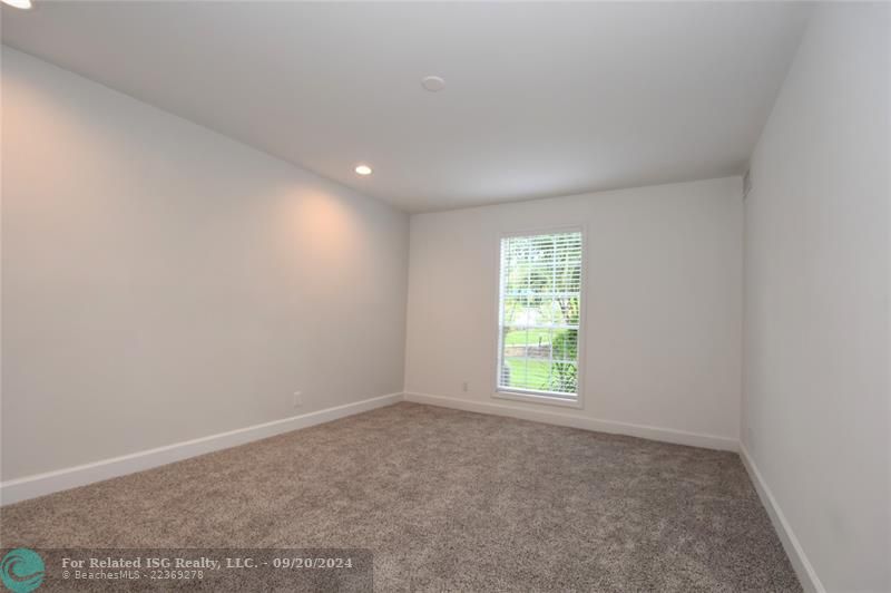 Spacious Master bedroom with greenbelt view to East