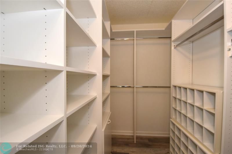 Master walkin closet with plenty of builtins