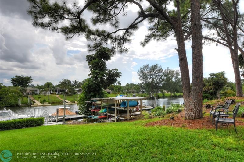 Large gathering area between pool and canal