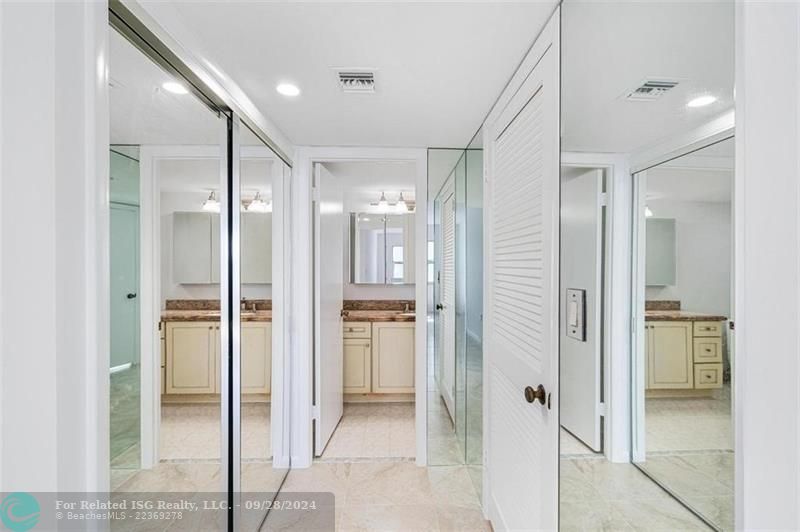 The primary bedroom has a large walk in closet on the right and another closet on the left.