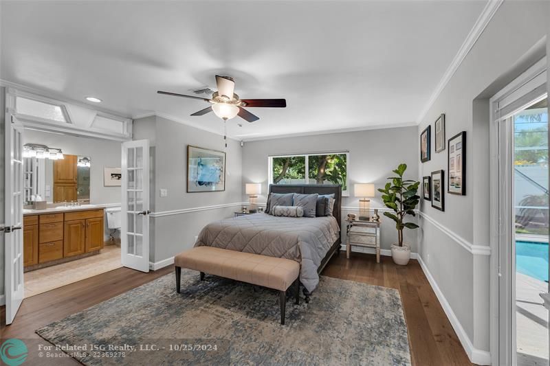 How sweet is this? French doors for the dressing area and bathroom, in this HUGE Primary Suite.