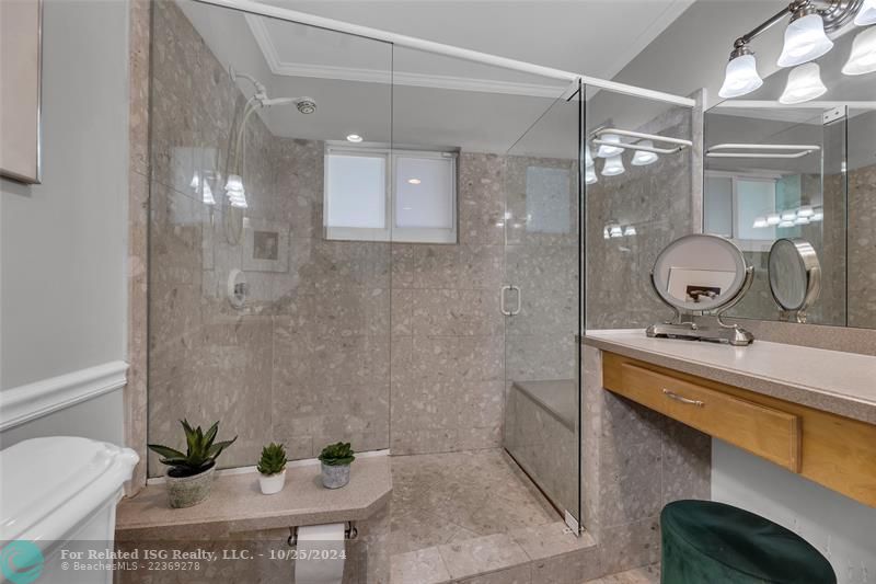 What??  A dedicated dressing table?  And is that a seal in the shower? Oh my, lets grab this house, honey!