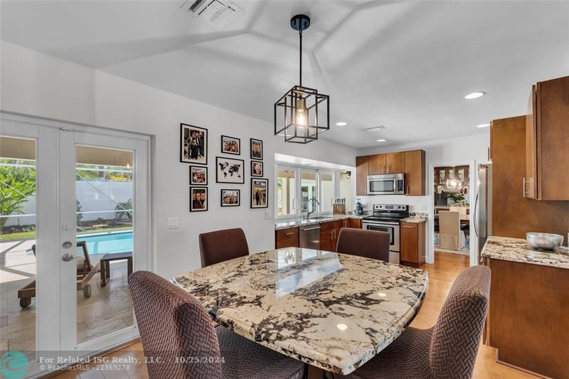 Here's the perspective on the entire kitchen as it relates to the patio and the pool.