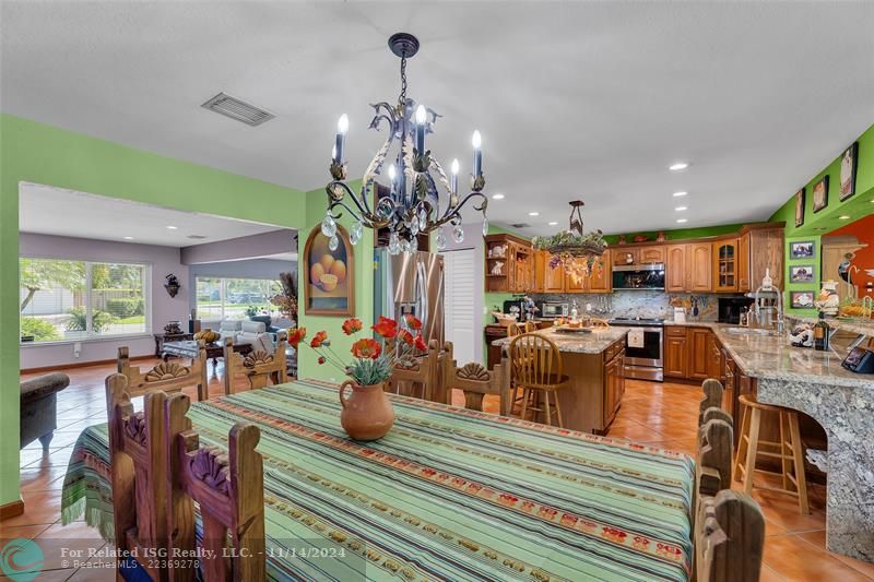 The dining area is central to this home which was MADE for entertaining!