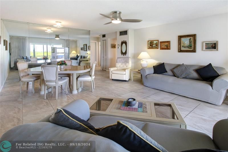 Living/dining facing the entrance to your foyer entrance with an impact door