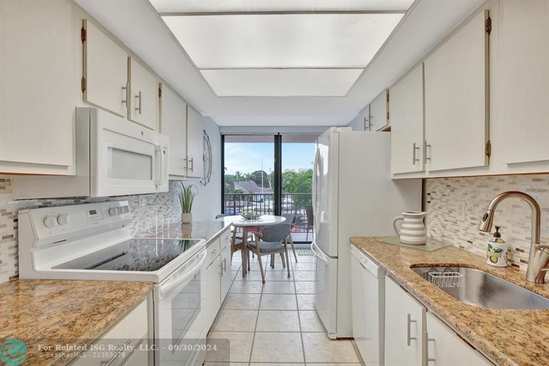 Kitchen with blinds open RR1101-209 Â©MWPA2024