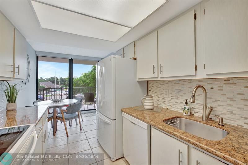 Kitchen with blinds open RR1101-209 Â©MWPA2024