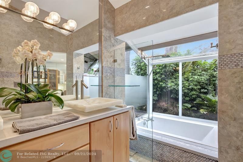 Greenhouse, spa-worthy primary bath/shower