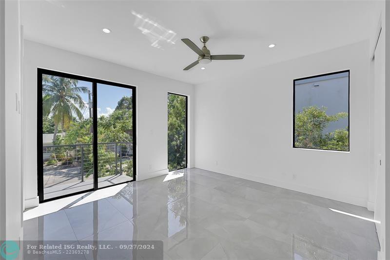 Third bedroom, with an on-suite bathroom and a balcony.