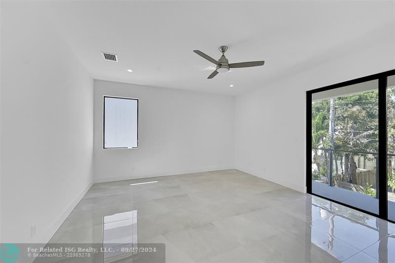 Oversized primary bedroom. With balcony and 2 closets.