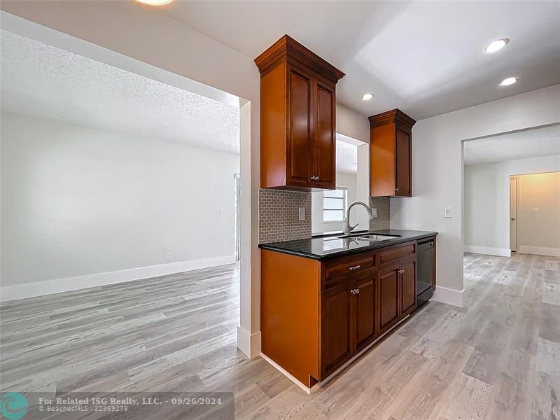 KITCHEN OPEN TO FAMILY ROOM