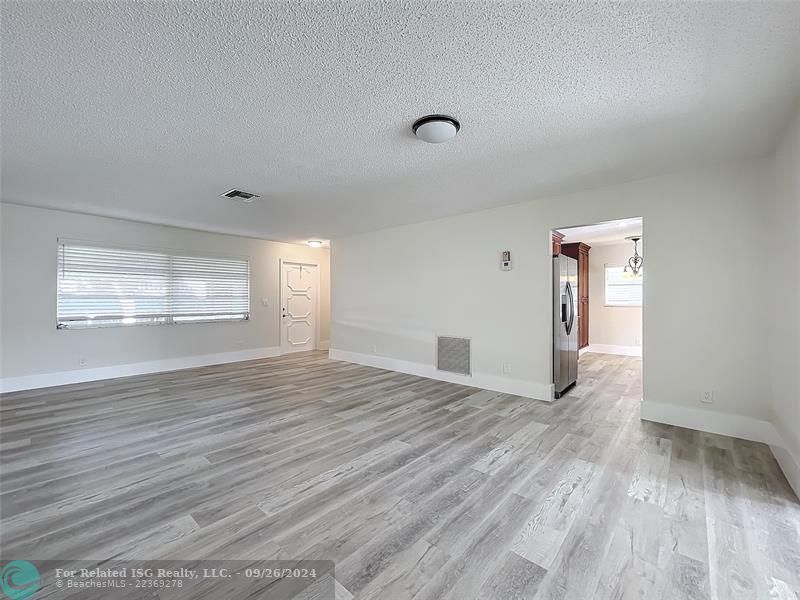 FRONT ENTRY/WINDOW -LIVING/DINING ROOM AREA