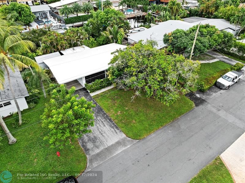 Covered parking with driveway.