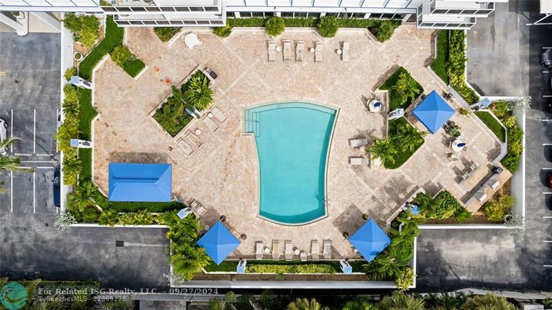 Resort style pool to enjoy laying out, swimming or BBQ after a beach day.