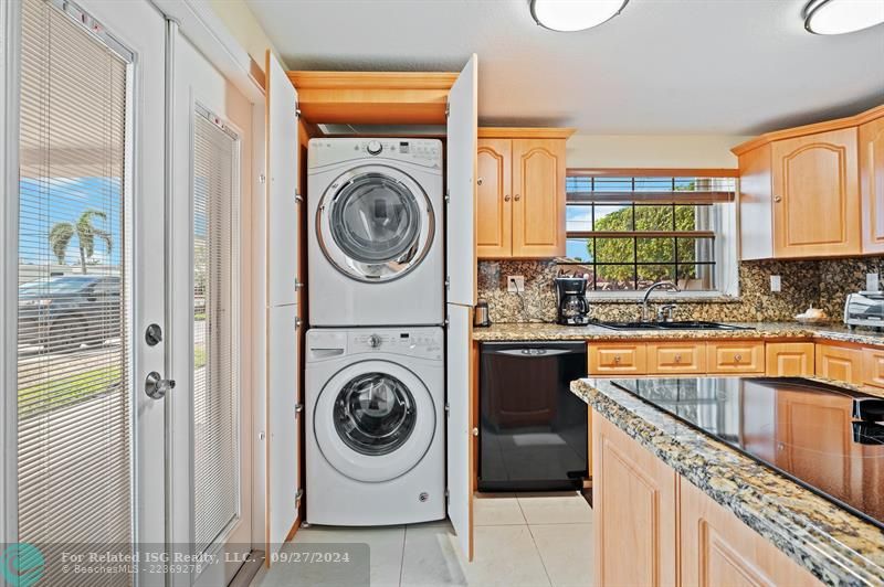 Washer & dryer are conveniently located in the kitchen