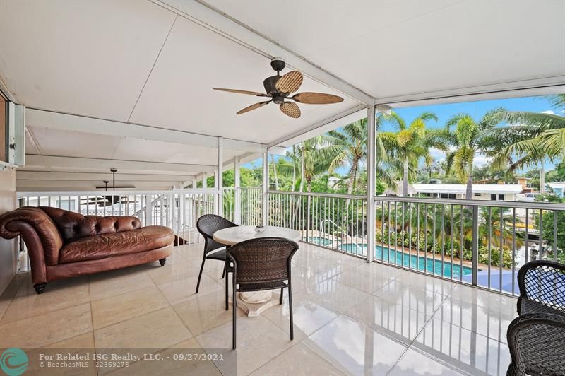 Screened balcony patio upstairs.