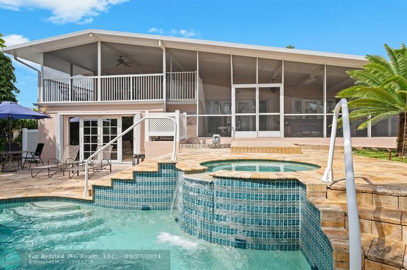 Spa waterfall into pool