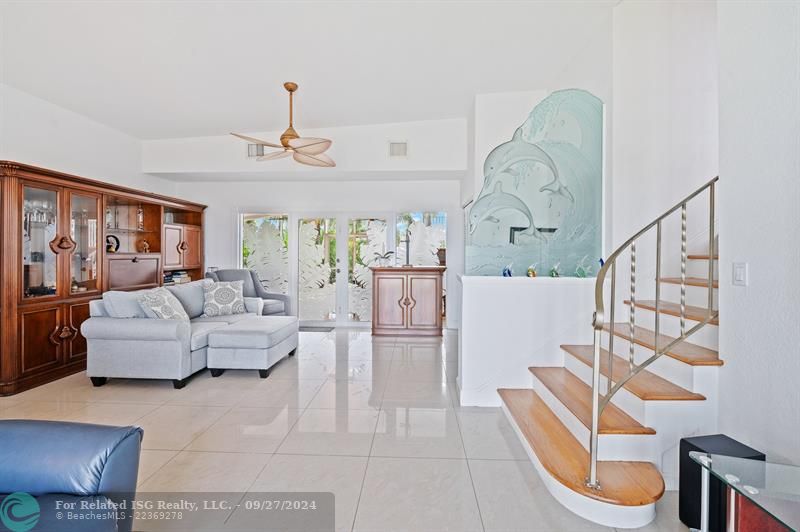 Light enters the home through the lovely etched french doors