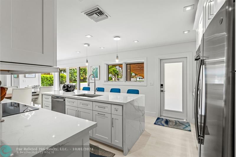 Kitchen with stainless steel appliances.