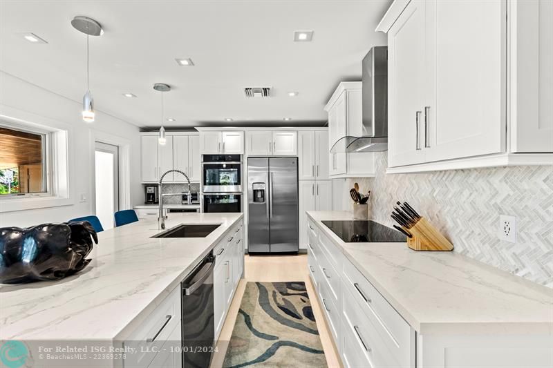 Kitchen with stainless steel appliances.