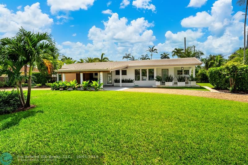 Front of the property with carport.