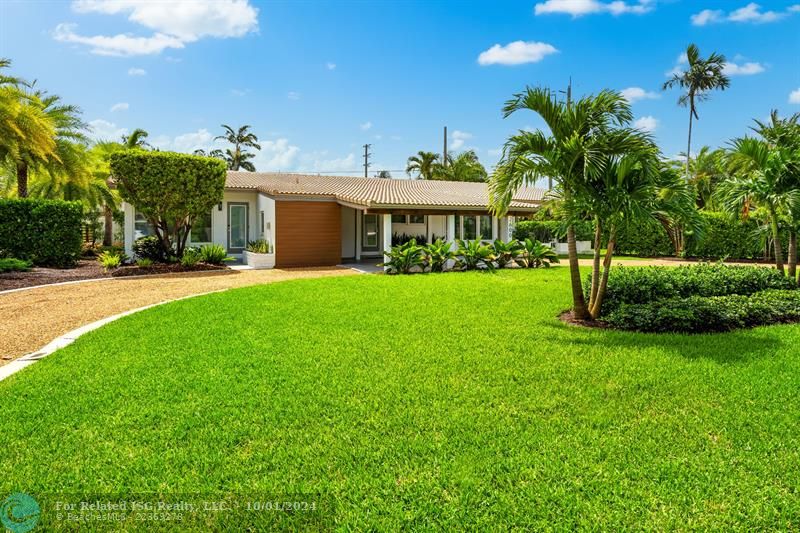 Front of the property with carport.