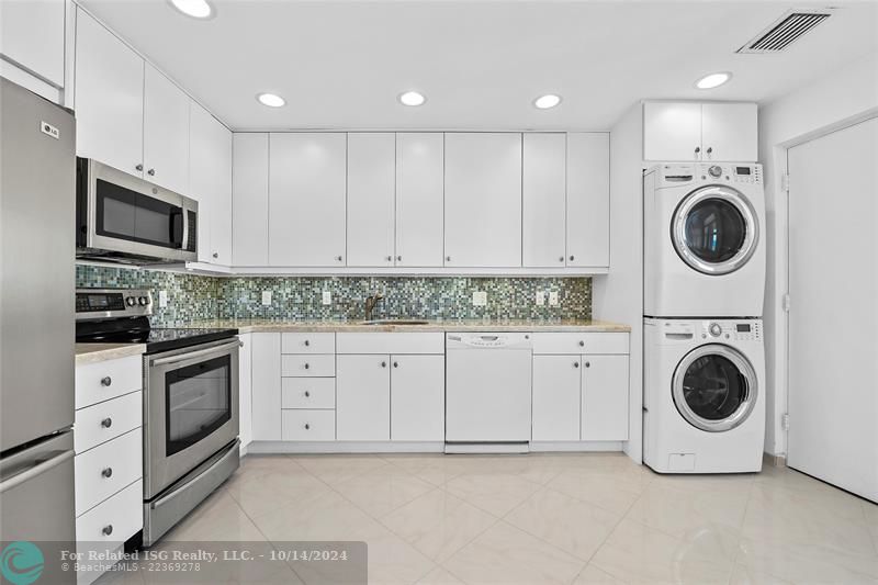 Kitchen w/ Crushed Quartz Countertops & Matching Backsplash