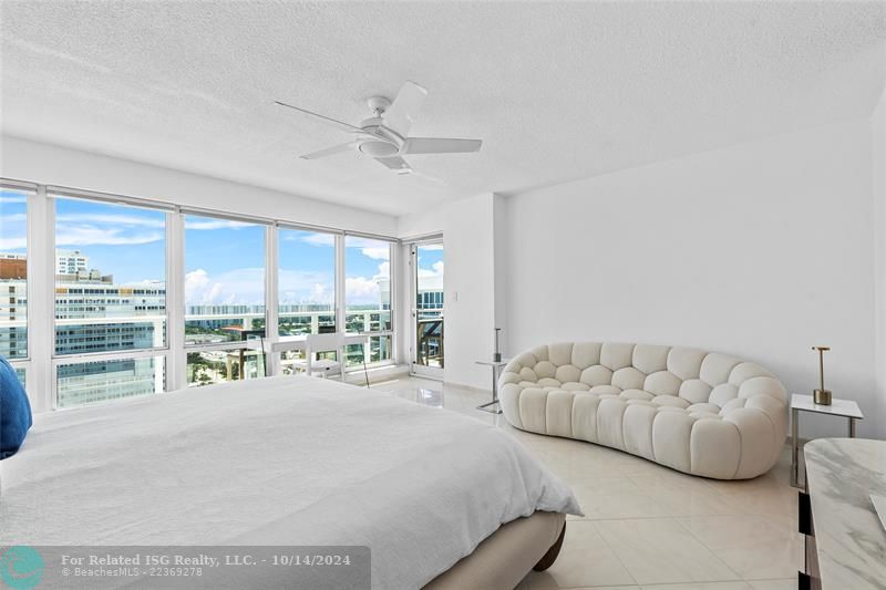 Primary Bedroom w/ City & Ocean Views