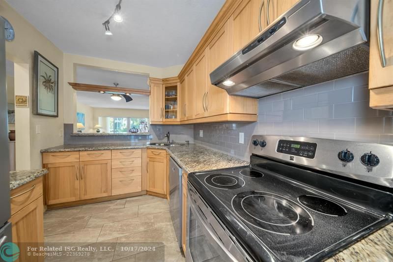 Wood Cabinetry Granite counters and stainless appliances