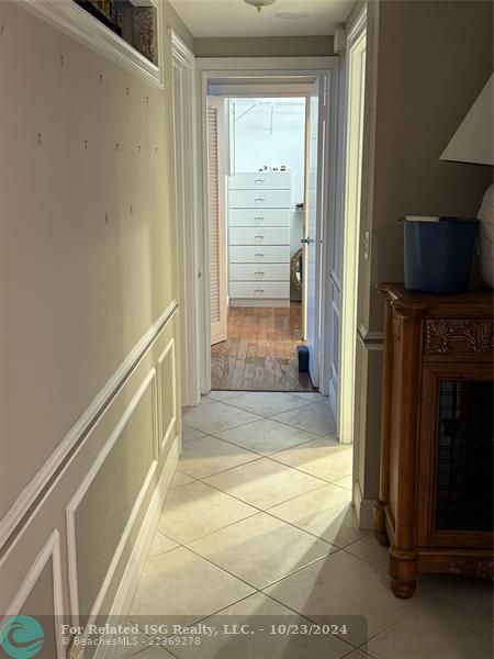 Hallway from kitchen to bedrooms/baths