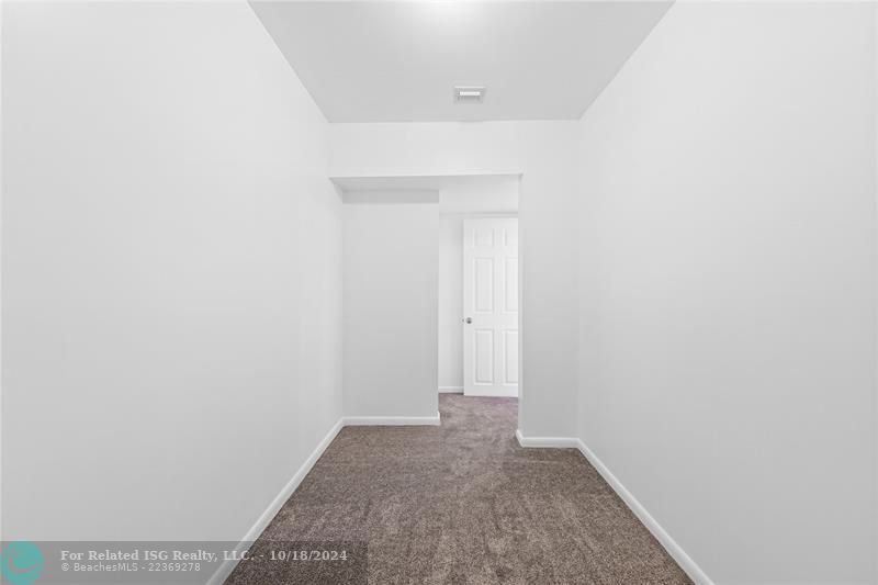 Huge walk in closet in primary bedroom